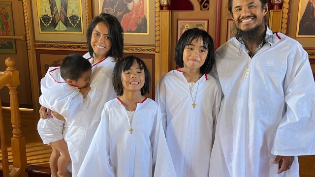 Swathed in Sacred Waters: The Significance of Baptism Robes